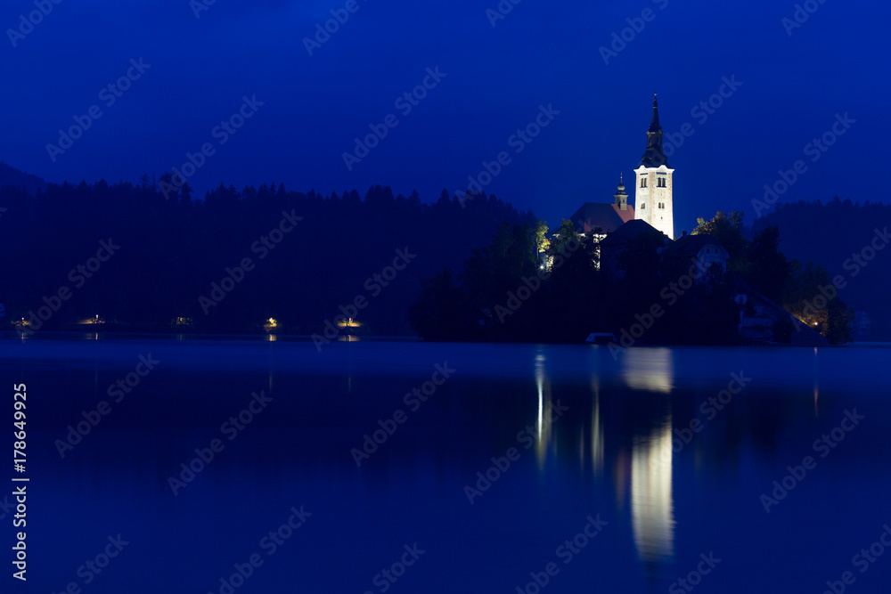 Church on island in Lake Bled in night, Slovenia