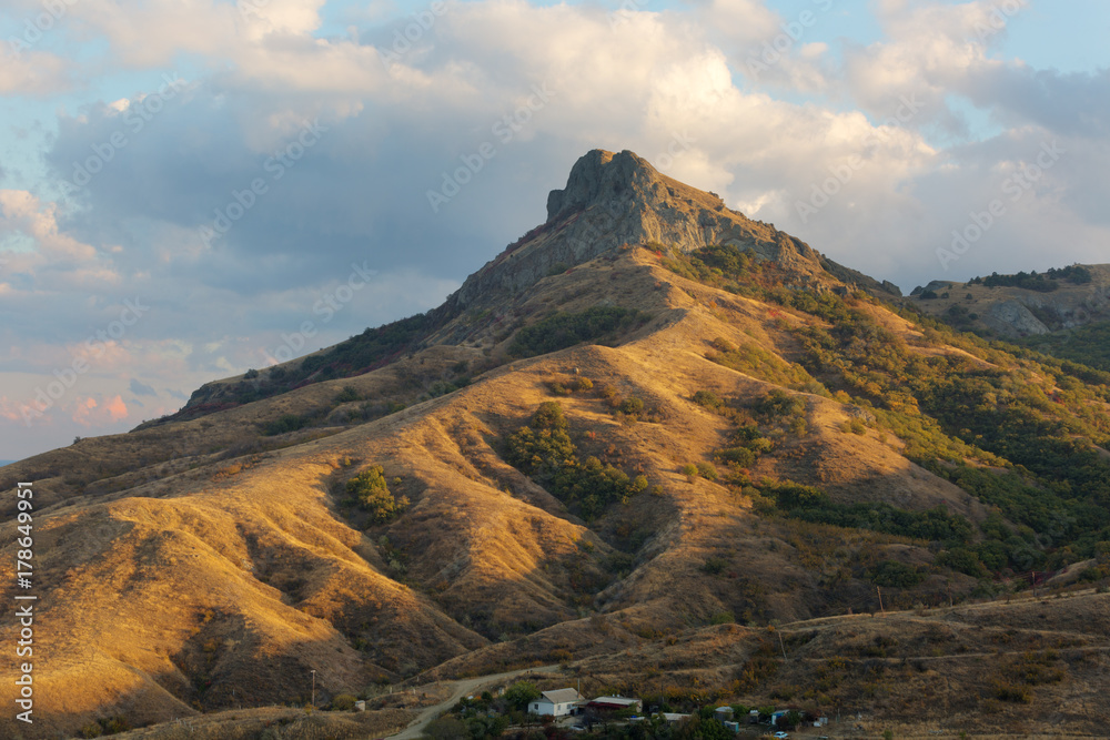 Rocks of the extinct volcano Kara-Dag at sunset, Crimea