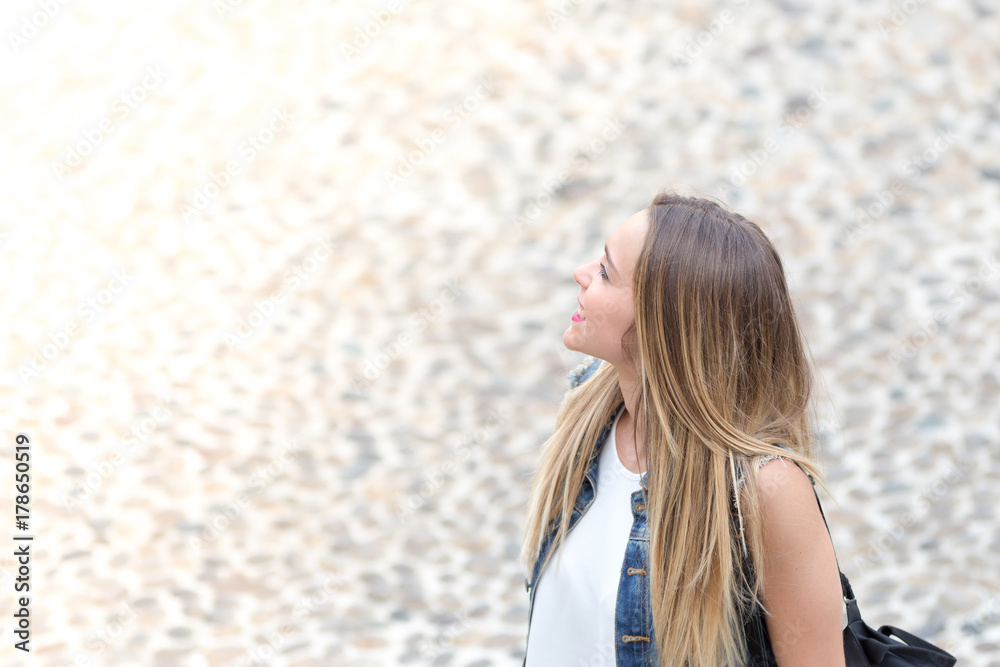 Happy young girl outdoor, horizontal banner photo with defocused copy space on the left Happy young girl outdoor, horizontal banner photo with defocused copy space on the left