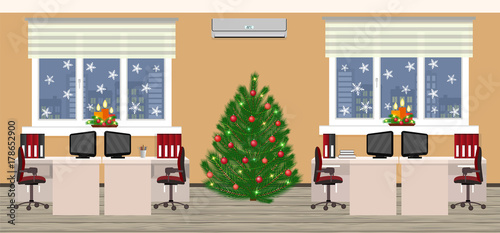 Office room interior in christmas design with two work spaces at evening before xmas. Holiday eve in company office.