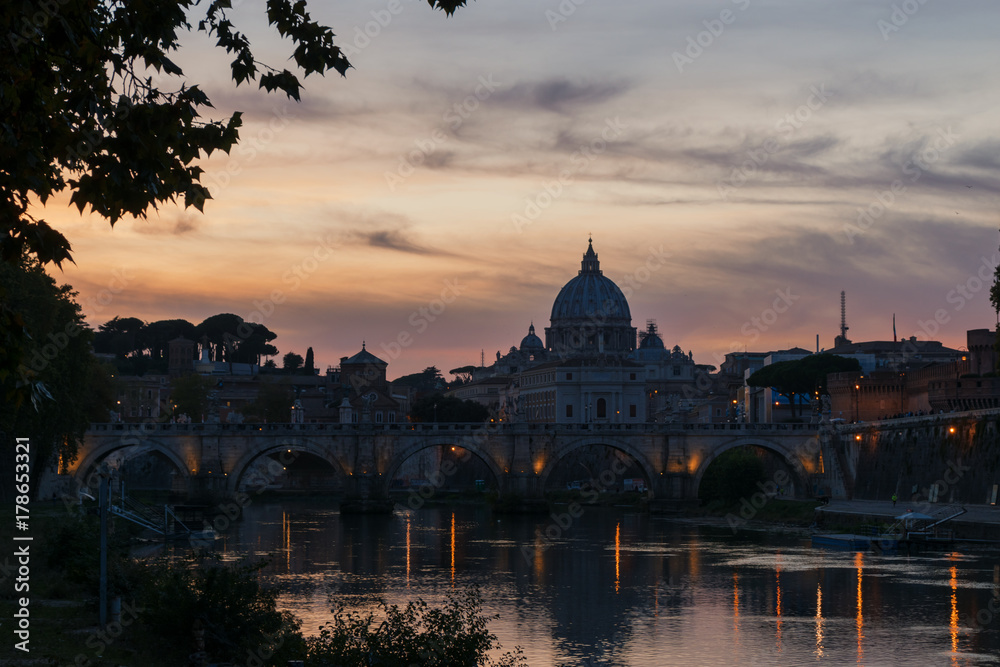 Rome tevere and Saint peter at sunset 