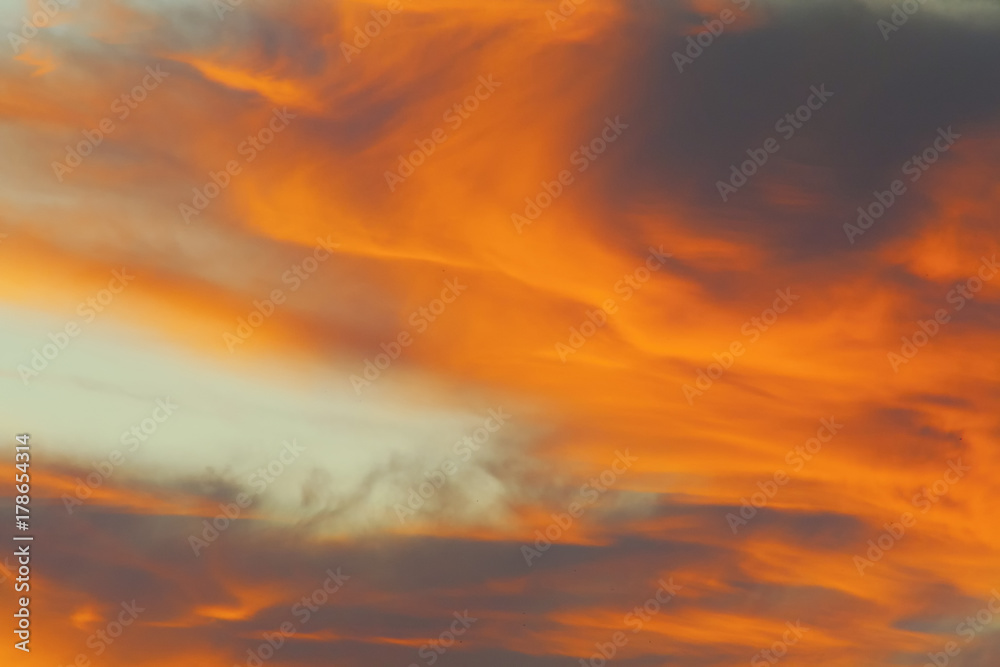 beautiful bright orange clouds in the early morning