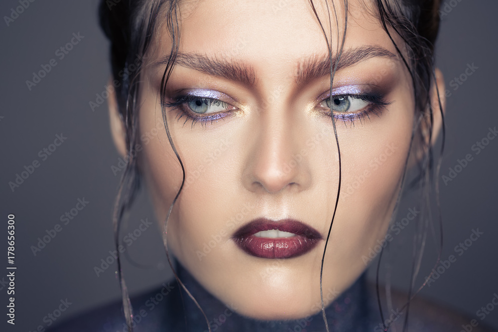 Fashion portrait of beautiful woman. Fantasy make-up. Fashion portrait of beautiful woman. Fantasy make-up.