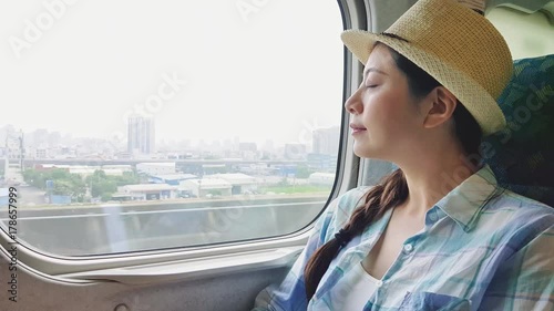 Woman relaxing enjoying view during commute.