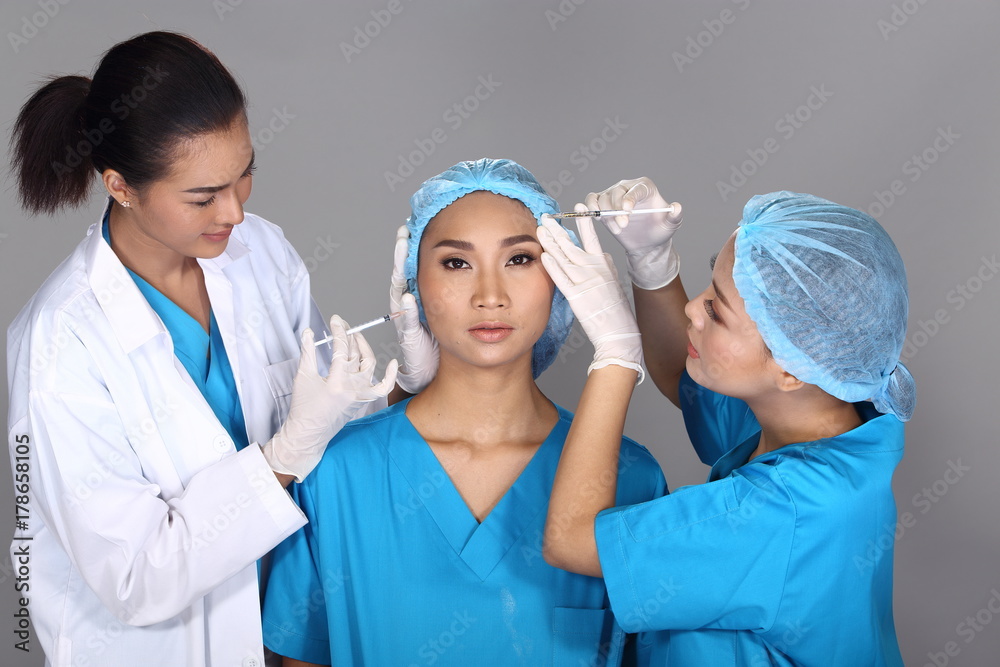 Beautician Doctor Check Diagnose Face structure patient before plastic surgery Beautician Doctor Check Diagnose Face structure patient before plastic surgery