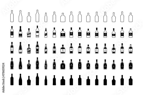 Set of black and white bottles of alcohol in different styles. Vector photo