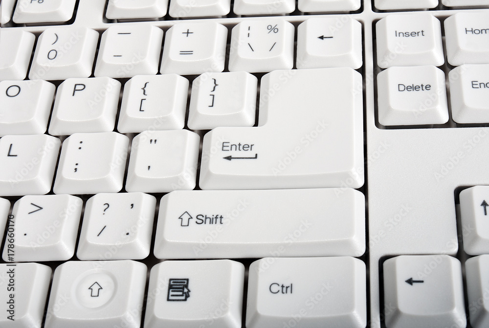 Computer white keyboard closeup Enter Shift Computer white keyboard closeup Enter Shift