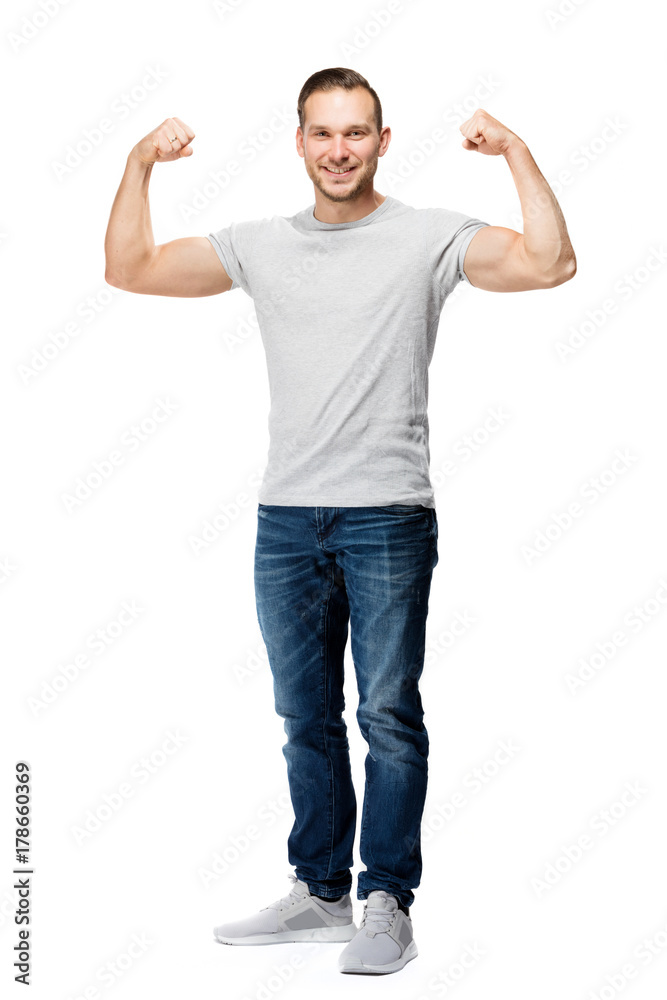 Fototapeta premium Happy positive man showing his strength.