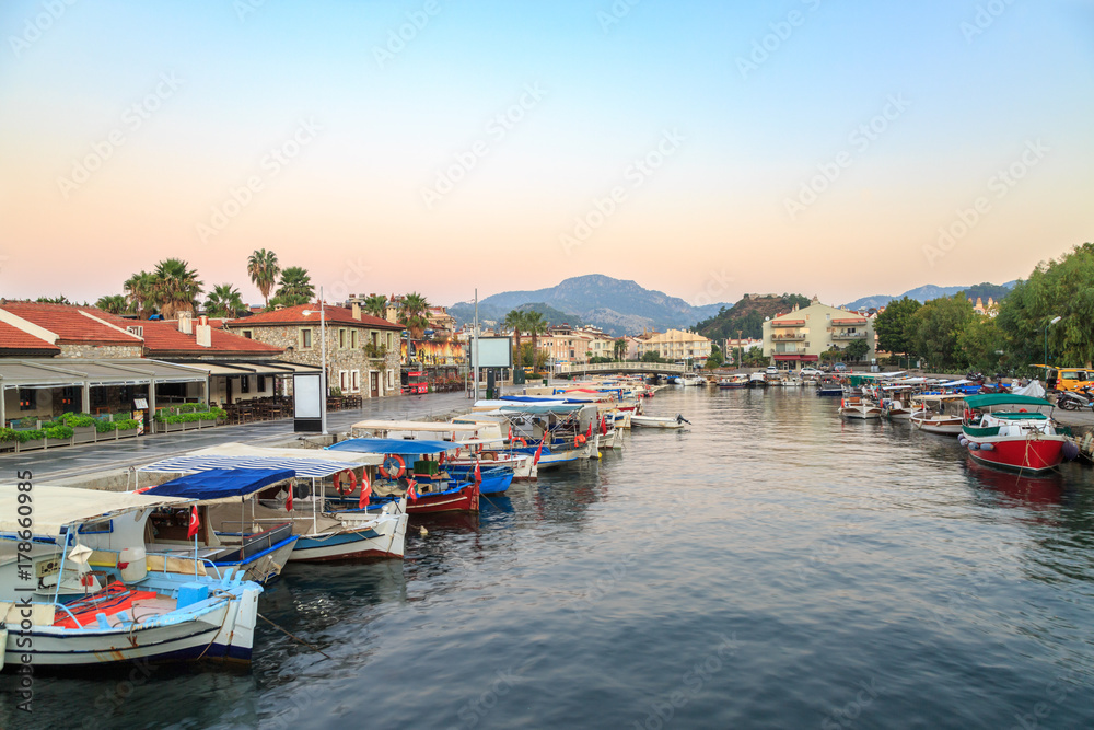 Fisher boats in the canal to sea near marina area in Marmaris, Turkey