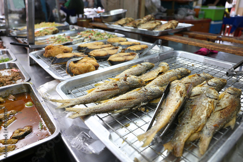 Photography Fried salted fish and various Thai style food for sell at Nang Loeng market, Ban