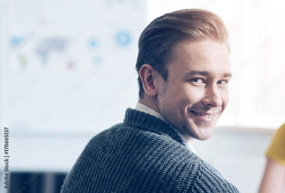 Smiling young man expressing positivity Smiling young man expressing positivity