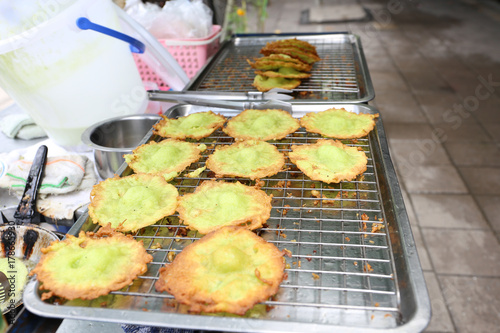 Pandan Sweetmeat, Khanom Krok Bai Toey for sell at Sutthisan market, Bangkok, Thailand, Street food photo