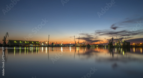 port on sunset with water reflections © Radoslav Nedelchev