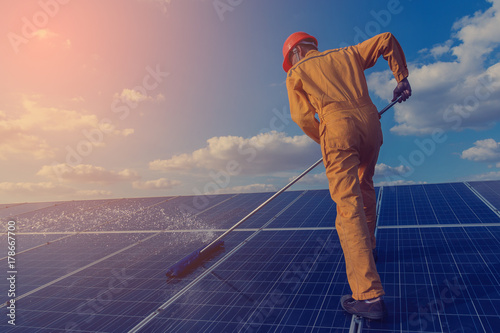 Wallpaper Mural operation and maintenance in solar power plant ; engineering team working on checking and maintenance in solar power plant ,solar power plant to innovation of green energy for life Torontodigital.ca