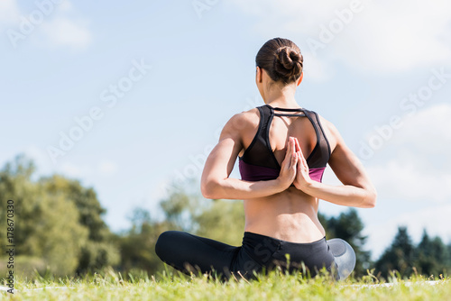 yogini in Reverse Prayer Pose