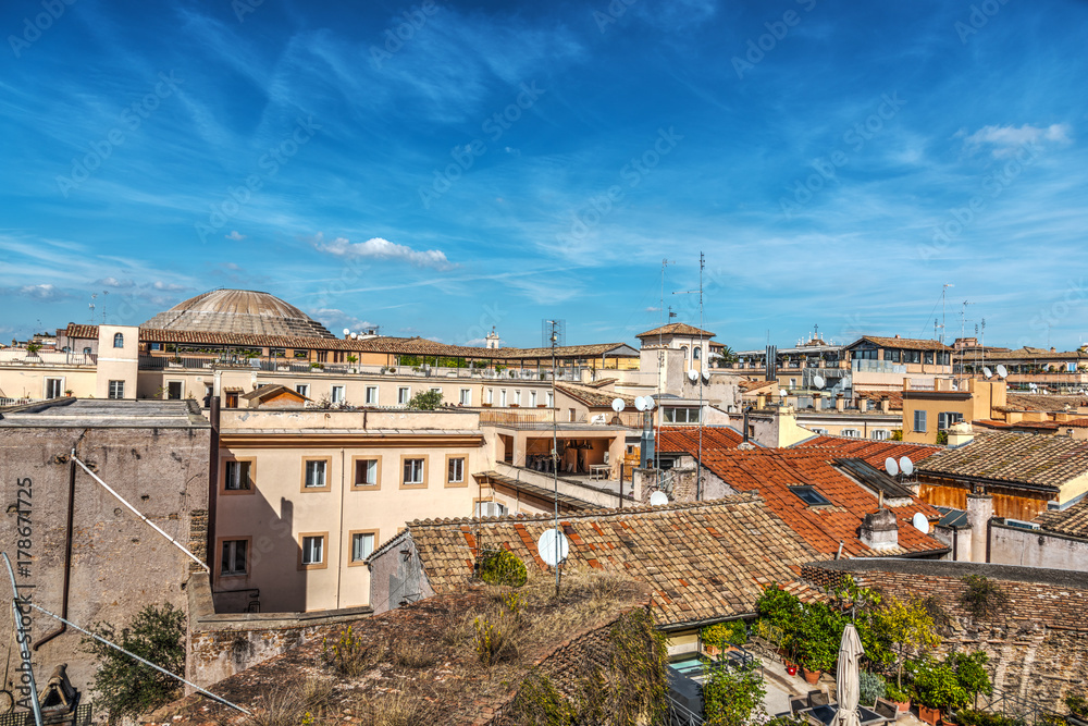 Blue sky over old roofs in Rome