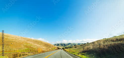 Blue sky over a country road in California