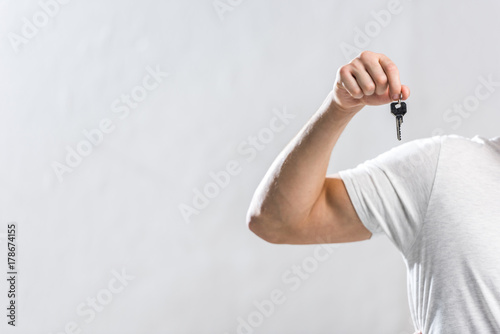 man showing key