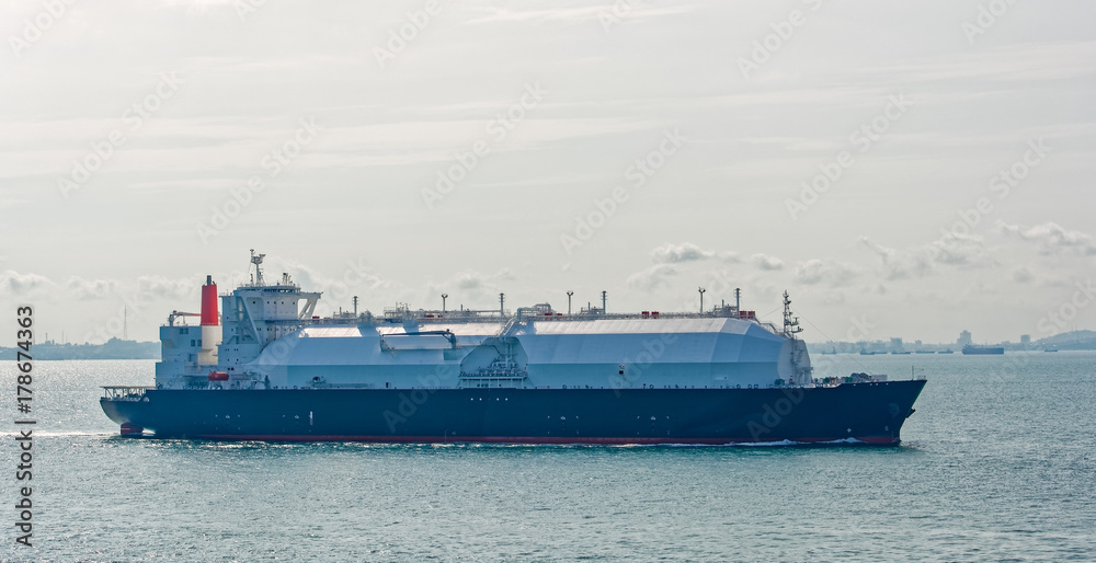 Fototapeta premium LNG tanker is passing by Singapore Strait.