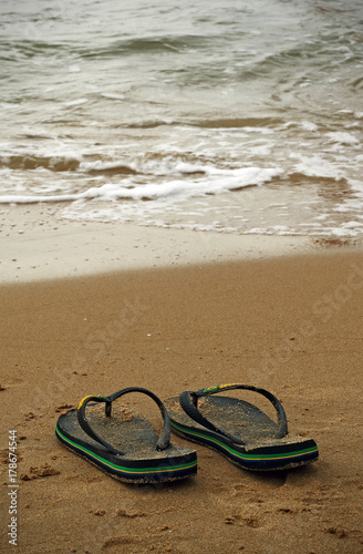 flip flops on the seashore