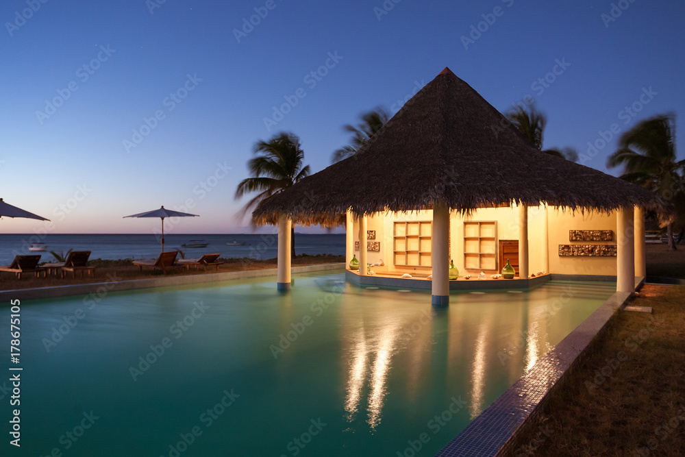 Sunset on swimming pool Sunset on swimming pool