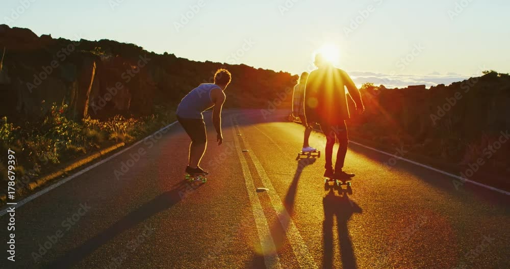 Friends Skateboarding at Sunset