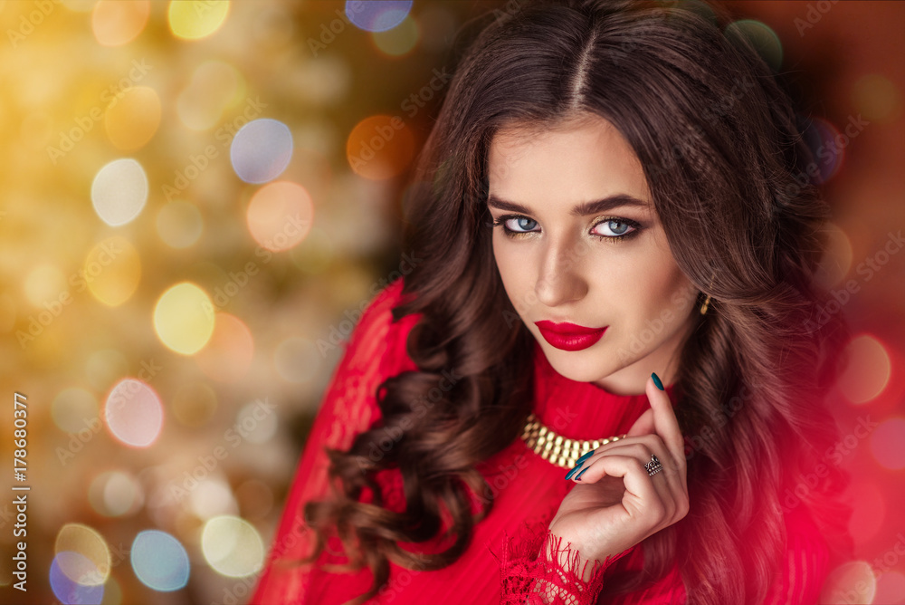 Beautiful girl in a red dress meets the new year Beautiful girl in a red dress meets the new year