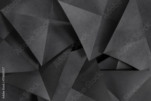 Conceptual composition with black geometric shapes, abstract background