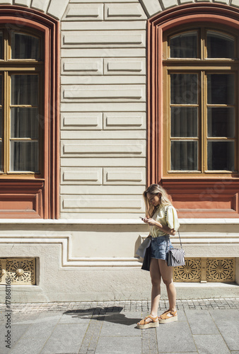 Woman Using Cell Phone Outdoors