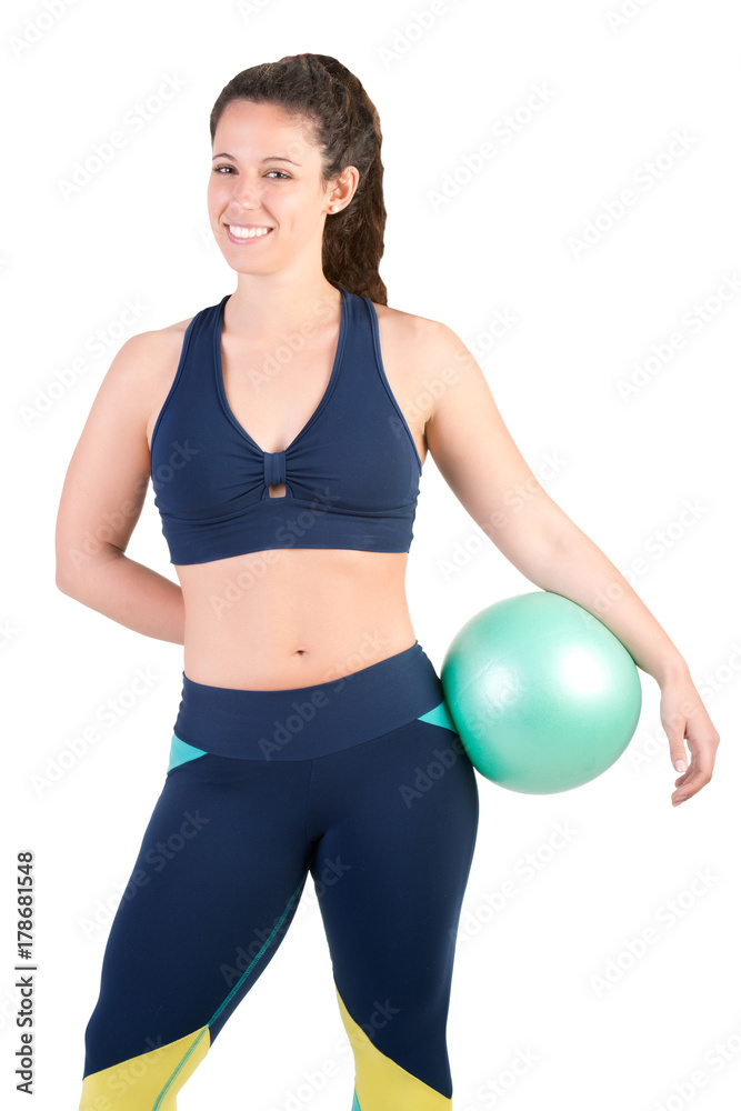 Fit Woman Standing Holding a Pilates Ball Fit Woman Standing Holding a Pilates Ball