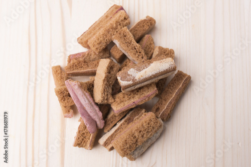 Sweet croutons on a wooden background photo