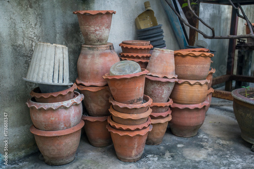 Used flower pots on the floor © suradeach seatang