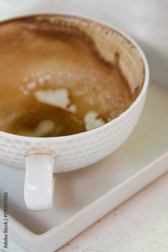 Hot cappuccino on white tray in morning time. Hot cappuccino on white tray in morning time.