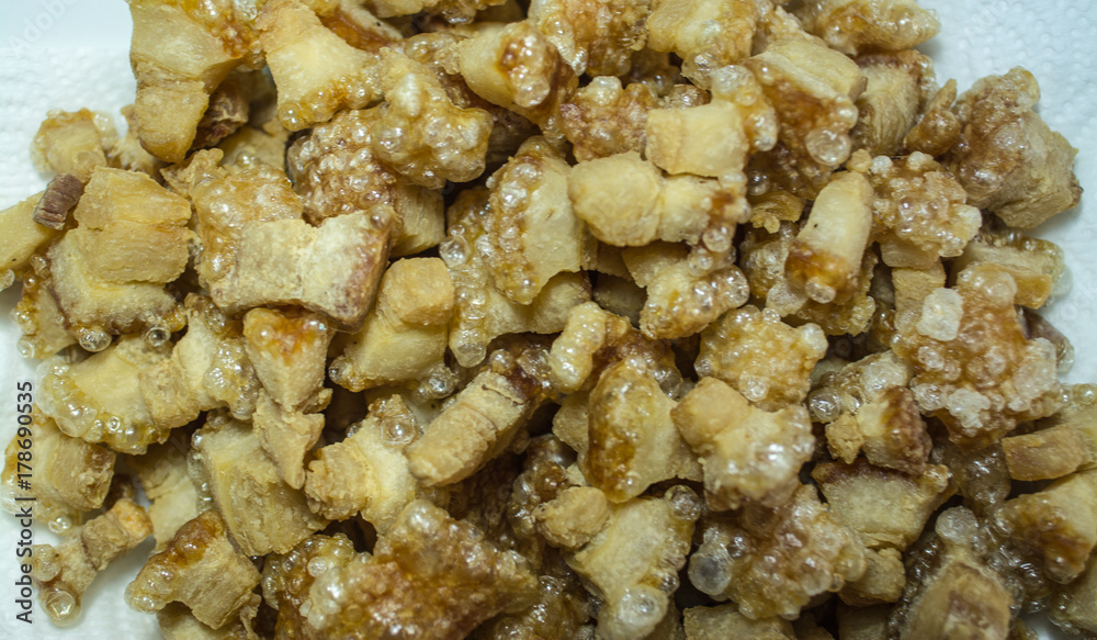 Cracking pork is crisped pork fat left in the pan after being fired for lard. Cracking pork is crisped pork fat left in the pan after being fired for lard.