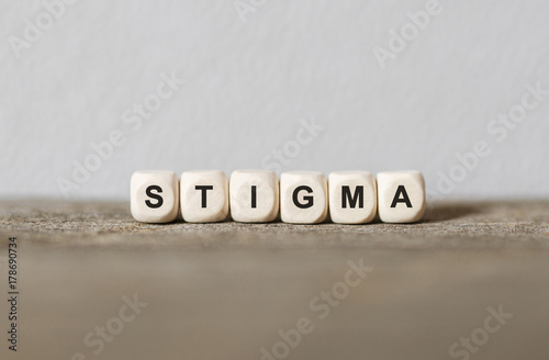 Word STIGMA made with wood building blocks