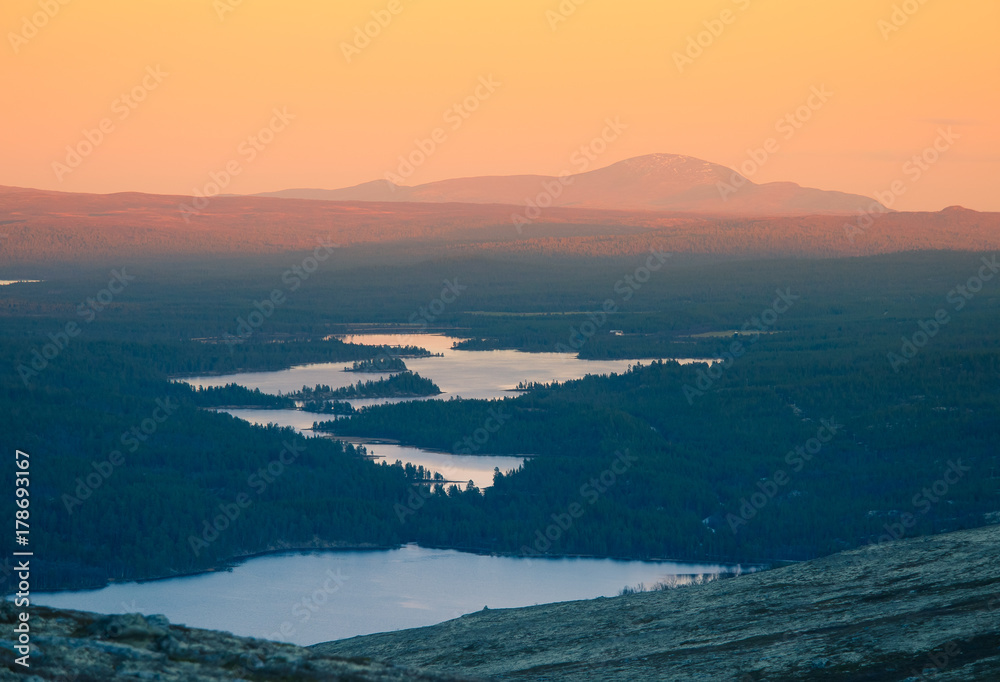 A beautiful, colorful sunset in mountains. Beautiful autumn in Norway. Abstract colorful look.