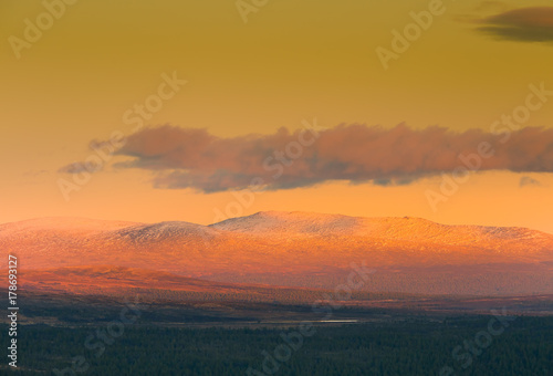 A beautiful  colorful sunset in mountains. Beautiful autumn in Norway. Abstract colorful look.