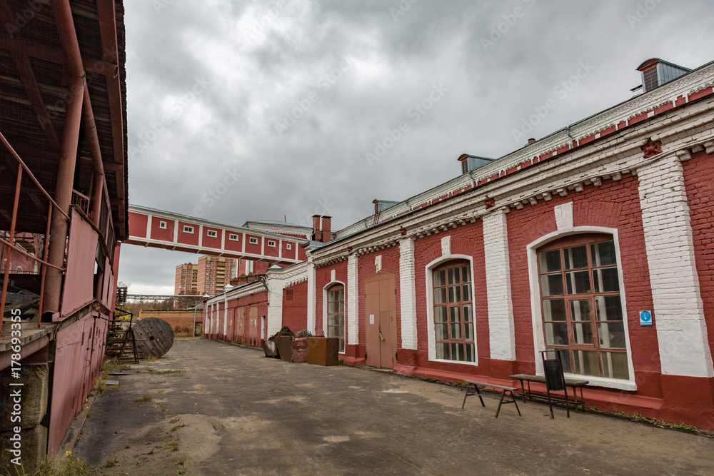 PAVLOVSKY POSAD, RUSSIA - OCTOBER 21, 2017: Brick buildings of the Labzin and Gryaznov Weaving Manufactures Association of the early 20th century
