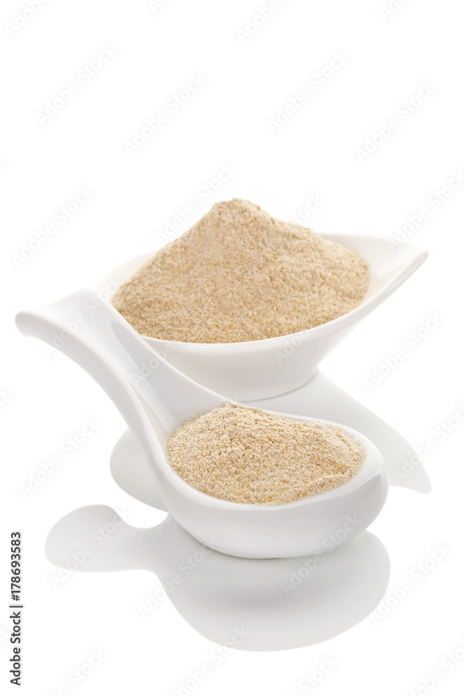 Ashwagandha powder on white background Ashwagandha powder on white background