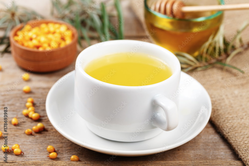 sea-buckthorn tea in a cup sea-buckthorn tea in a cup