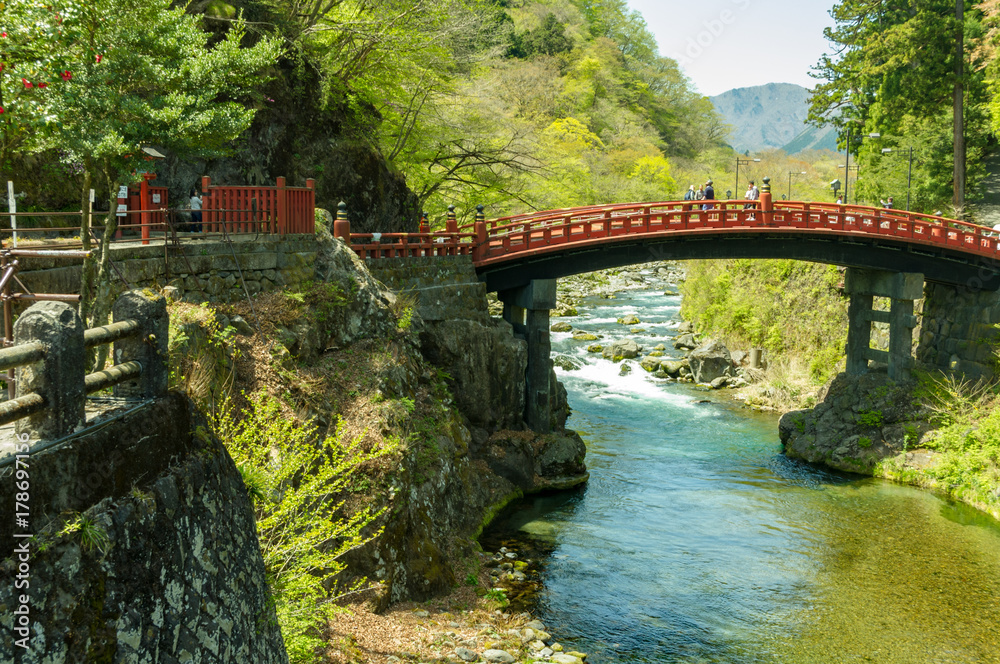 Fototapeta premium Japan traditional wooden arch bridge over river