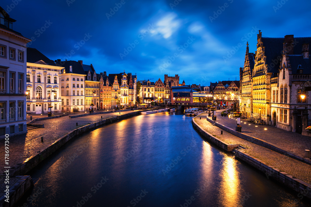 Graslei street and canal in the evening. Ghent, Belgium