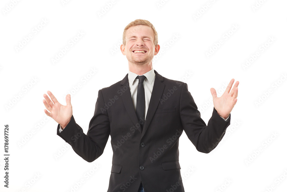 Portrait of ecstatic young businessman in black suit on white background Portrait of ecstatic young businessman in black suit on white background