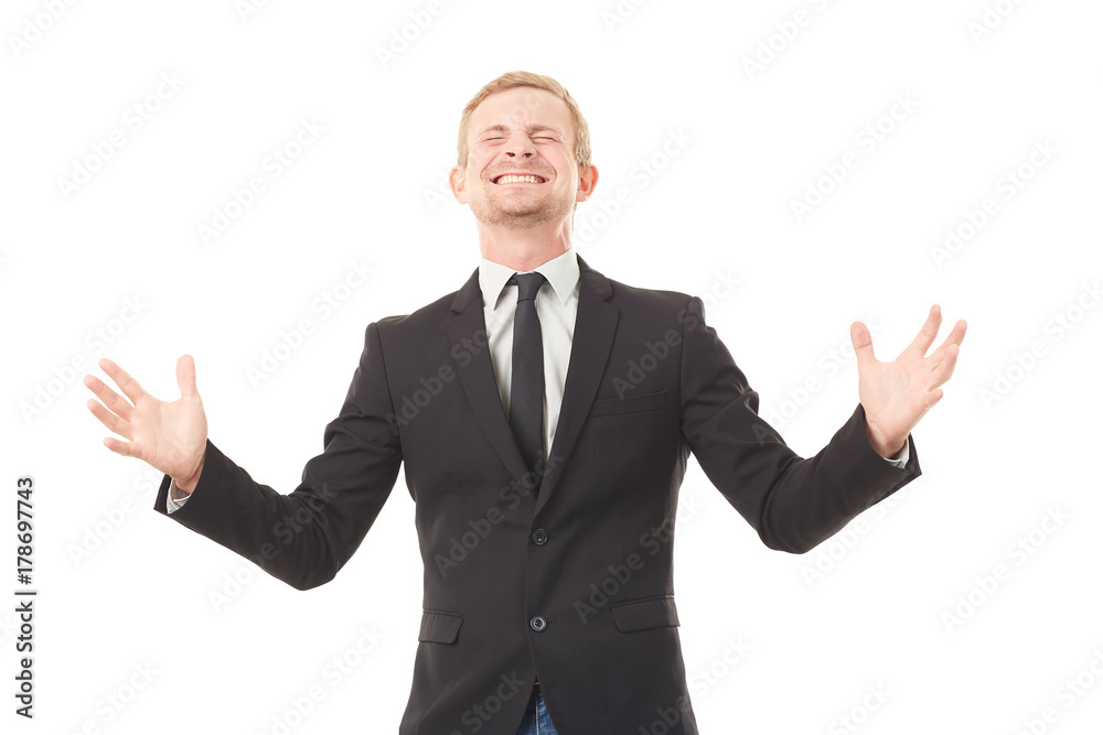 Portrait of ecstatic young businessman in black suit on white background Portrait of ecstatic young businessman in black suit on white background
