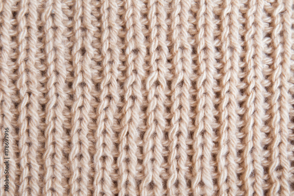 wallpaper background texture of a knitted brown beige sweater cl