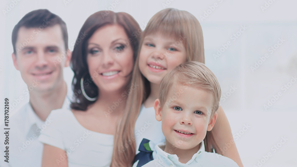 Beautiful happy family - isolated over a white background Beautiful happy family - isolated over a white background