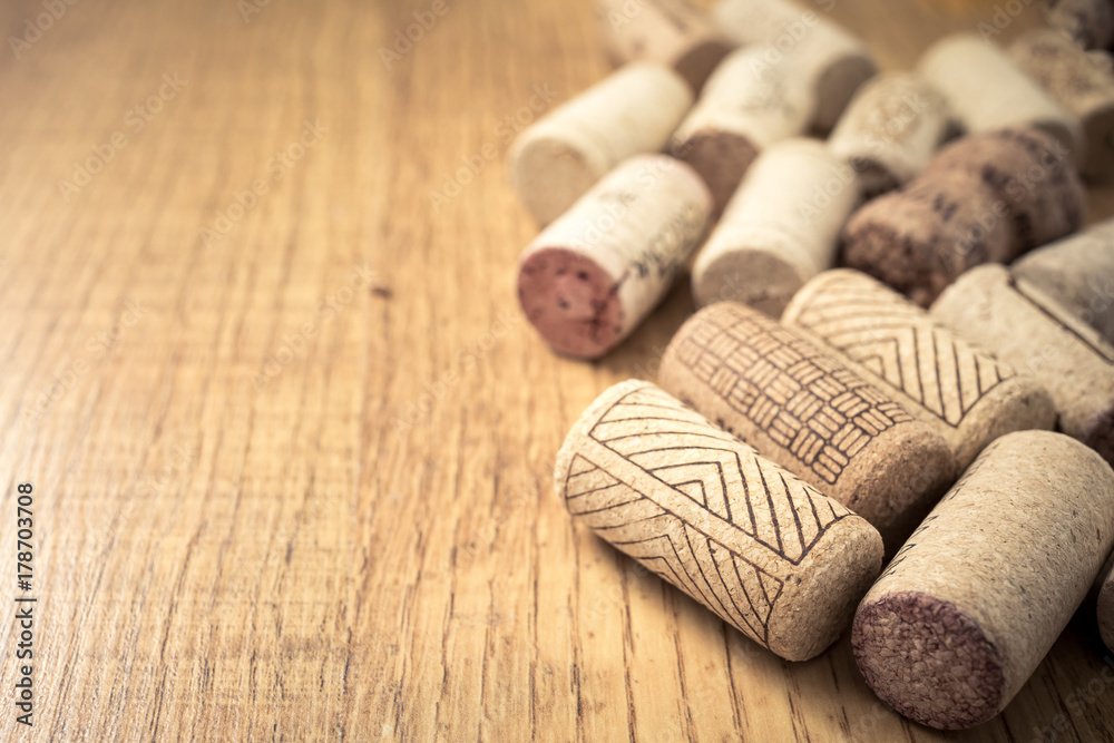 Bunch of wine corks on wooden table Bunch of wine corks on wooden table