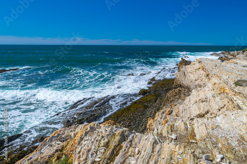 Exploring the Pacific shoreline at Spooner's Cove, Bluff Trail, Montana de Oro State Park, Morro Bay, San Luis Obispo County, California, USA