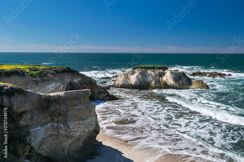Exploring the Pacific shoreline at Spooner's Cove, Bluff Trail, Montana de Oro State Park, Morro Bay, San Luis Obispo County, California, USA