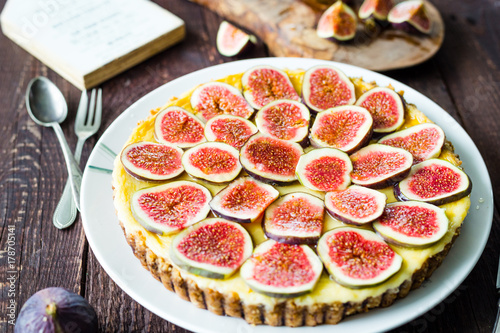 Homemade Cake with Fresh Figs and Goat Cheese on Dark Rustic Wooden Table, Horizontal View